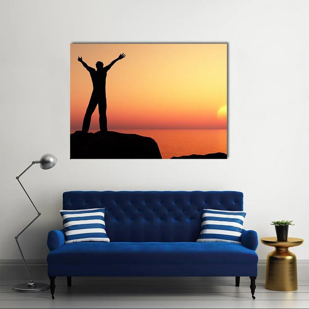 Man Greeting Sun Canvas Wall Art